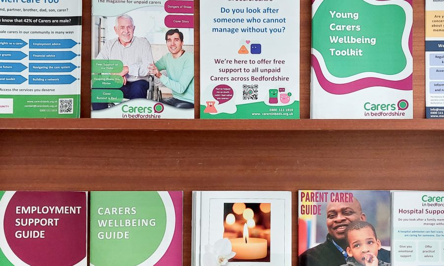 A bookshelf of resources from Carers in Bedfordshire